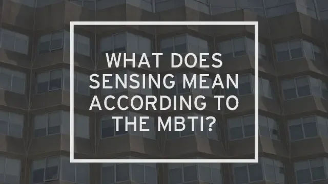 Modern architecture with the words "what does sensing mean according to the MBTI?" written over it.
